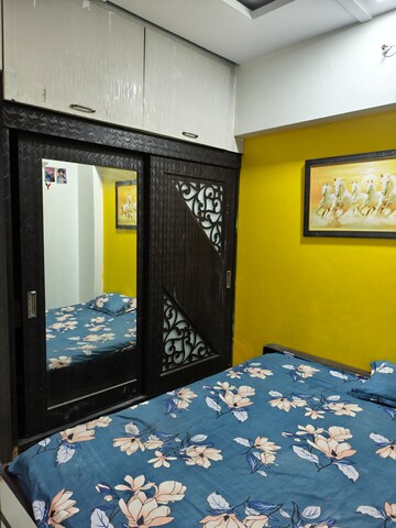 Bedroom in 2 BHK Apartment at Agarwal Vrindavan Gardens, Vasai East – for Rent