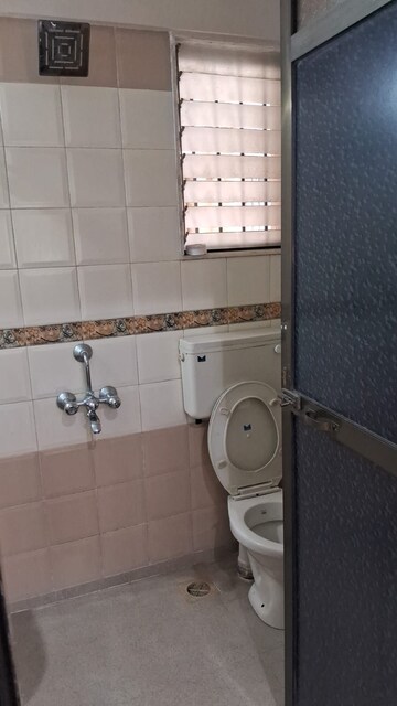 Bathroom in 2 BHK Apartment at Jasmine Tower, Vasant Vihar – for Rent
