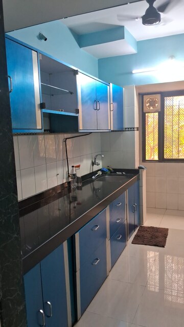 Kitchen in 2 BHK Apartment at Jasmine Tower, Vasant Vihar – for Rent