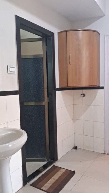 Bathroom in 2 BHK Apartment at Jasmine Tower, Vasant Vihar – for Rent