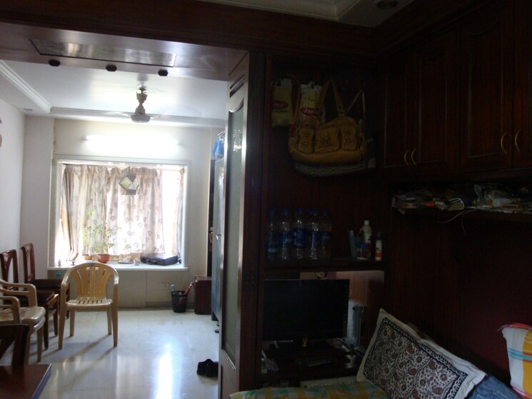 Living Room, emerald-chs 2 Bedroom 600 Sq.Ft. Apartment In Bandra West Mumbai 8707018