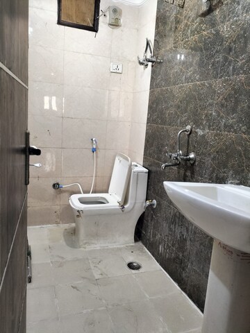 Bathroom in 3 BHK Apartment at Palam Vihar – for Sale