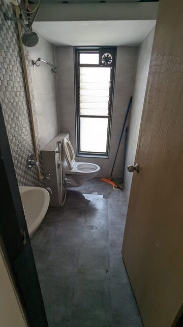Bathroom in 3 BHK Apartment at Bajaj Enchante Panchsheel CHS, Andheri West – for Rent