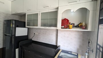 Kitchen in 3 BHK Apartment at Bajaj Enchante Panchsheel CHS, Andheri West – for Rent