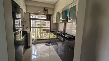 Kitchen in 3 BHK Apartment at Bajaj Enchante Panchsheel CHS, Andheri West – for Rent