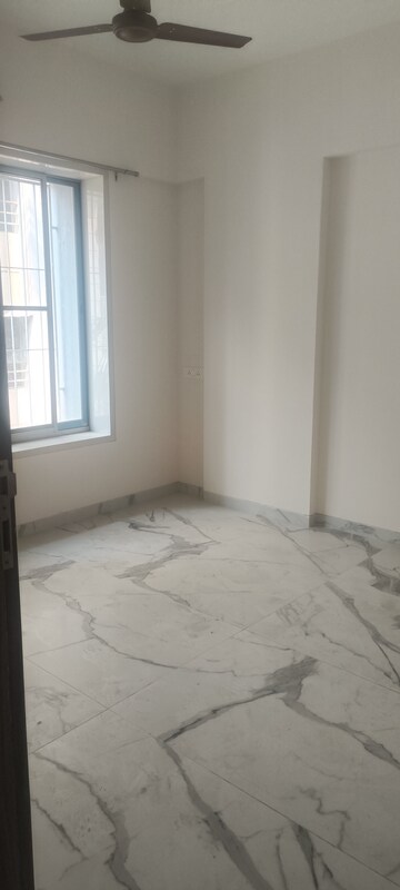 Room in 2 BHK Apartment at Swojas Suman, Law College Road – for Rent