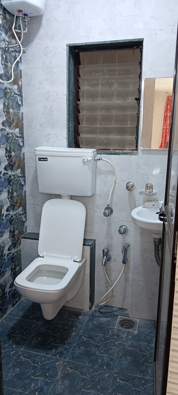 Bathroom in 1 BHK Apartment at Kshitij CHS, Goregaon East – for Rent