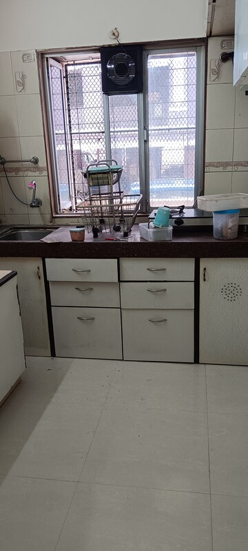 Kitchen in 1 BHK Apartment at Riddhi Gardens CHS, Malad East – for Rent