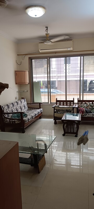 Living Room in 1 BHK Apartment at Riddhi Gardens CHS, Malad East – for Rent