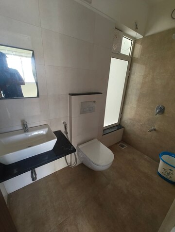 Bathroom in 1 BHK Apartment at Omkar Signet, Malad East – for Rent