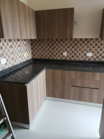Kitchen in 3 BHK Apartment at Adani M2K Oyster Grande, Sector 102 – for Sale