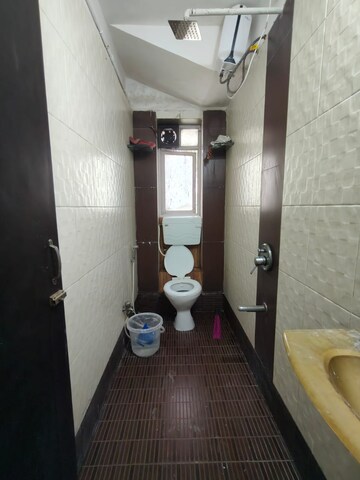 Bathroom in 2 BHK Apartment at Bharat Apartment Juhu, Juhu – for Rent