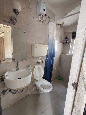 Bathroom in 2 BHK Apartment at Bharat Apartment Juhu, Juhu – for Rent