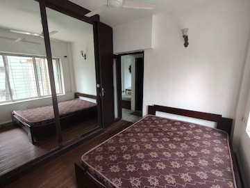 Bedroom in 2 BHK Apartment at Bharat Apartment Juhu, Juhu – for Rent