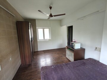 Living Room in 2 BHK Apartment at Bharat Apartment Juhu, Juhu – for Rent