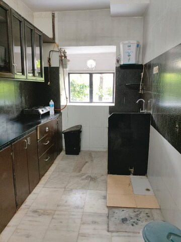 Kitchen in 2 BHK Apartment at Bharat Apartment Juhu, Juhu – for Rent