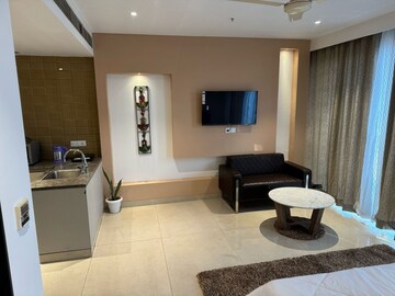 Living Room in Studio Apartment at AIPL Joy Street, Sector 66 – for Rent