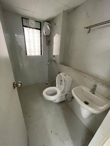 Bathroom in 1 BHK Apartment at Runwal Gardens Phase I, Dombivli East – for Rent