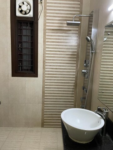 Bathroom in 1.5 BHK Builder Floor at Prashant Vihar – for Rent