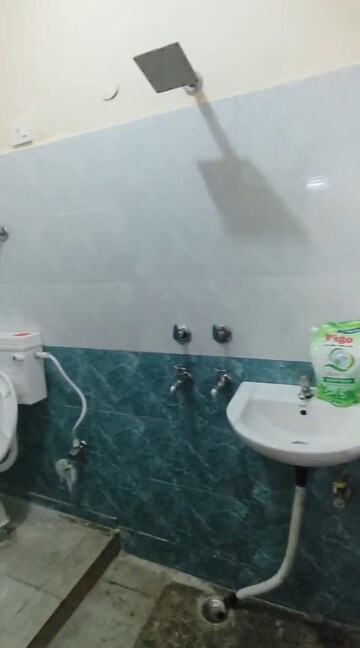 Bathroom in 3 BHK Apartment at Veera Safdarjung Enclave, Safdarjung Enclave – for Rent