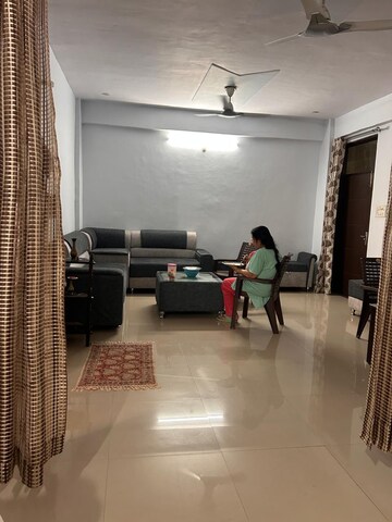 Living Room in 3 BHK Apartment at Emaar The Palm Drive-Palm Studios, Sector 66 – for Sale