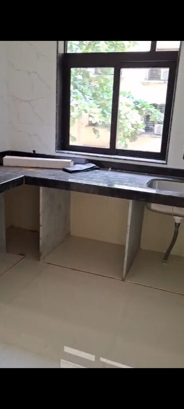 Kitchen in 2 BHK Apartment at Chaitanya CHS Vile Parle, Vile Parle East – for Rent