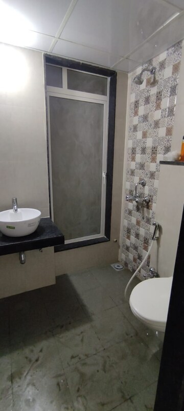 Bathroom in 1.5 BHK Apartment at MICL Aaradhya Highpark, Mira Road – for Rent