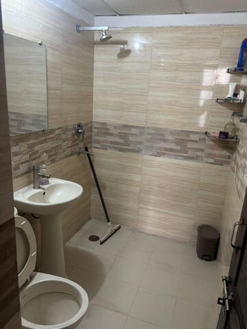 Bathroom in 2.5 BHK Apartment at Amrapali Zodiac, Sector 120 – for Sale