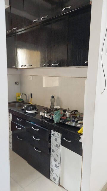 Kitchen in 2 BHK Apartment at Salasar Cosmos CHS, Mira Road – for Rent