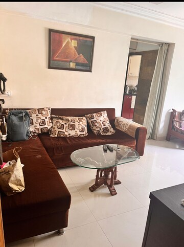 Living Room in 1 BHK Apartment at Shree Chitrakut CHS, Dahisar East – for Rent