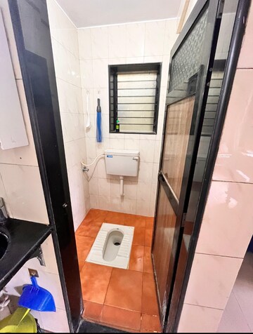 Bathroom in 1 BHK Apartment at Shree Chitrakut CHS, Dahisar East – for Rent