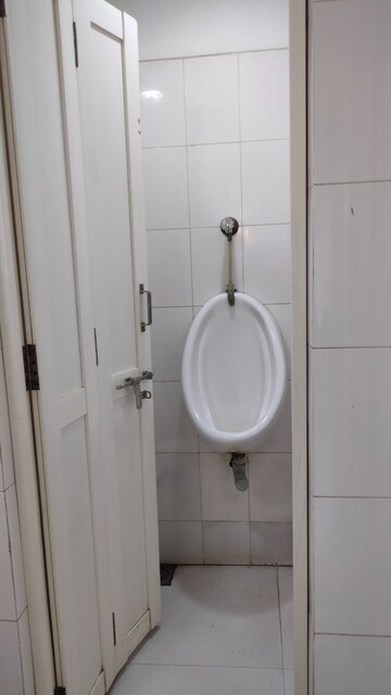 Bathroom in  Office Space at Savvy Shapath V, Prahlad Nagar – for Rent