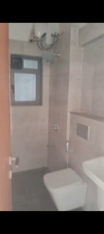 Bathroom in 1 BHK Apartment at Dynamix Avanya, Dahisar East – for Rent