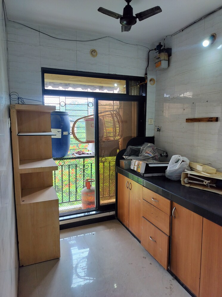 Kitchen, suncity-srushti-chs 2 Bedroom 900 Sq.Ft. Apartment In Nerul Sector 27 Navi Mumbai 8708883