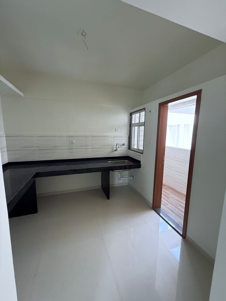 Kitchen, rr-lunkad-66-avenue 3 Bedroom 956 Sq.Ft. Apartment In Pimple Nilakh Pune 8709040