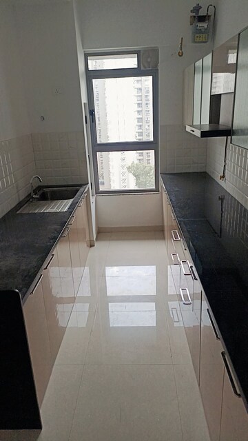 Kitchen in 2 BHK Apartment at Kalpataru Immensa, Kolshet Road – for Rent