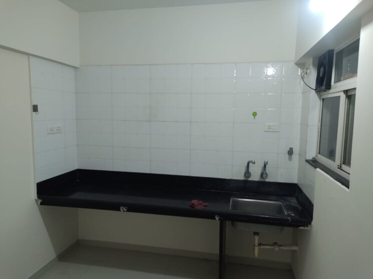 Kitchen, atrium-skyward 2 Bedroom 1200 Sq.Ft. Apartment In Undri Pune 8709131