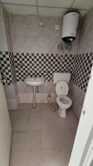 Bathroom in 1 BHK Apartment at Signature Global Synera, Sector 81 – for Sale