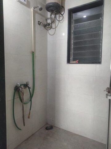 Bathroom in 2 BHK Apartment at Alica Nagar CHS, Kandivali East – for Sale