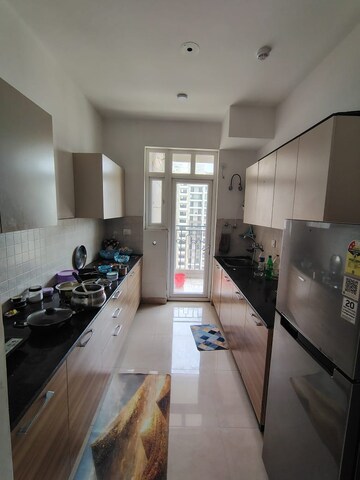 Kitchen in 3.5 BHK Apartment at ATS Nobility, Sector 4 Greater Noida – for Rent