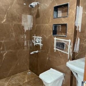 Bathroom in 2 BHK Apartment at Hargobind Enclave – for Sale