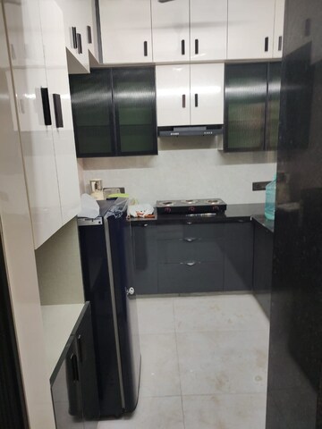 Kitchen in 2 BHK Apartment at Shipra Suncity – for Rent