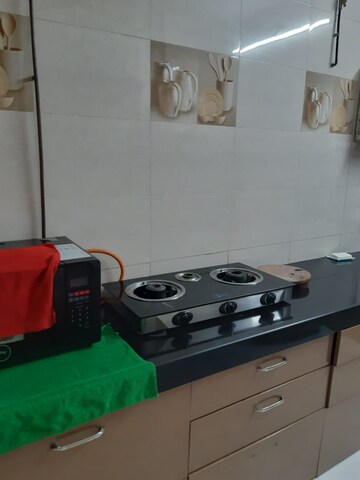 Kitchen in 1 BHK Apartment at Hiranandani Estate Riviera, Ghodbunder Road – for Rent