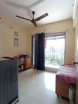 Living Room in 1 BHK Apartment at Shraddha Nipun Galaxy, Bhandup West – for Sale