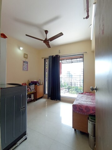 Living Room in 1 BHK Apartment at Shraddha Nipun Galaxy, Bhandup West – for Sale