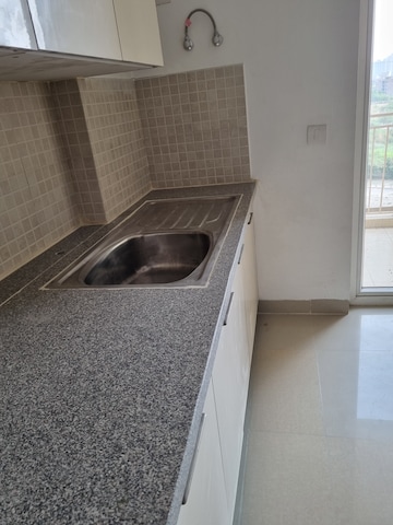 Kitchen in 3 BHK Apartment at Emaar Gurgaon Greens, Sector 102 – for Sale