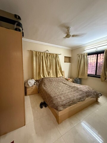 Bedroom in 3 BHK Apartment at Green Valley CHS, Wanwadi – for Rent