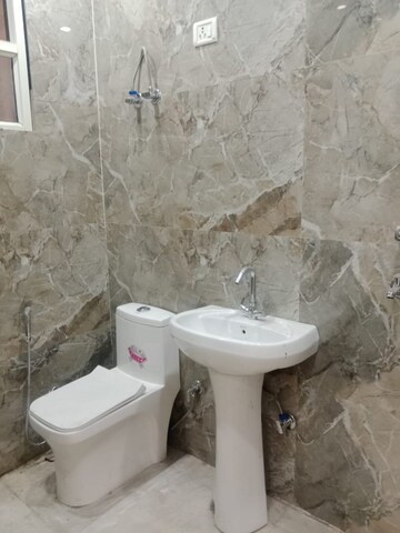 Bathroom in 4 BHK Builder Floor at Gyan Khand ii – for Sale