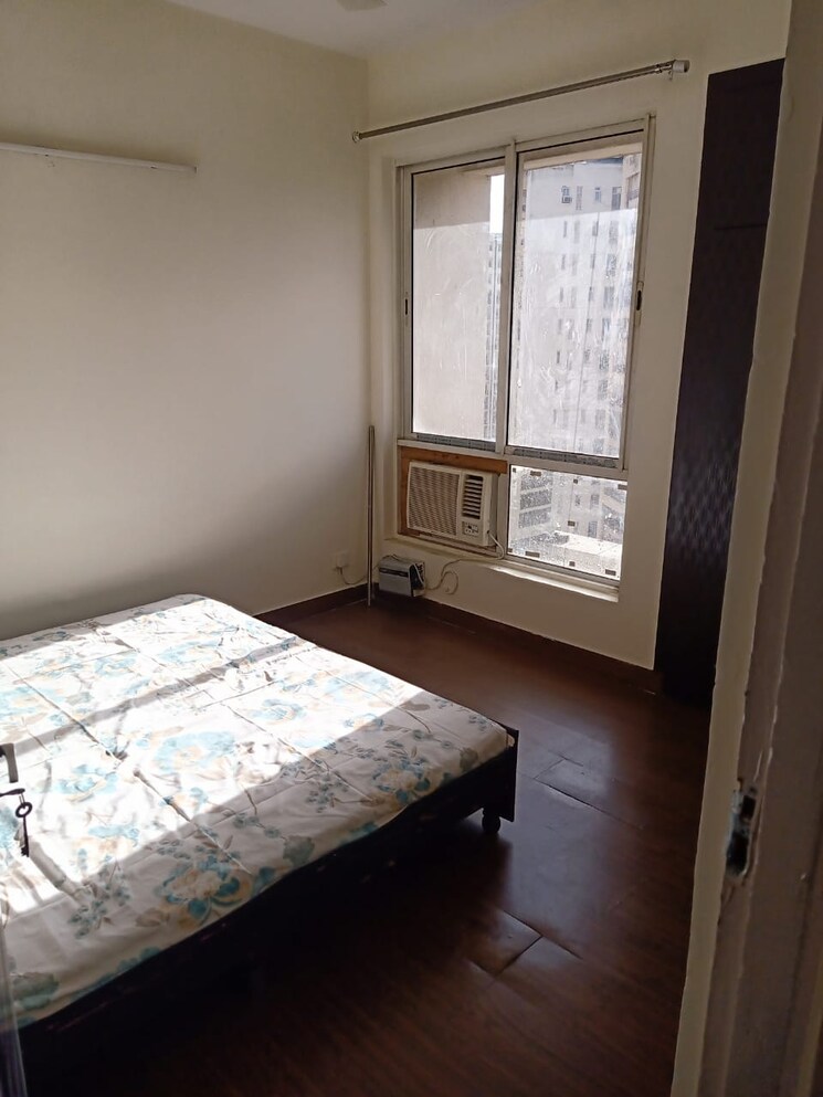 Bedroom, jaypee-greens-kosmos 2 Bedroom 950 Sq.Ft. Apartment In Sector 134 Noida 8710864