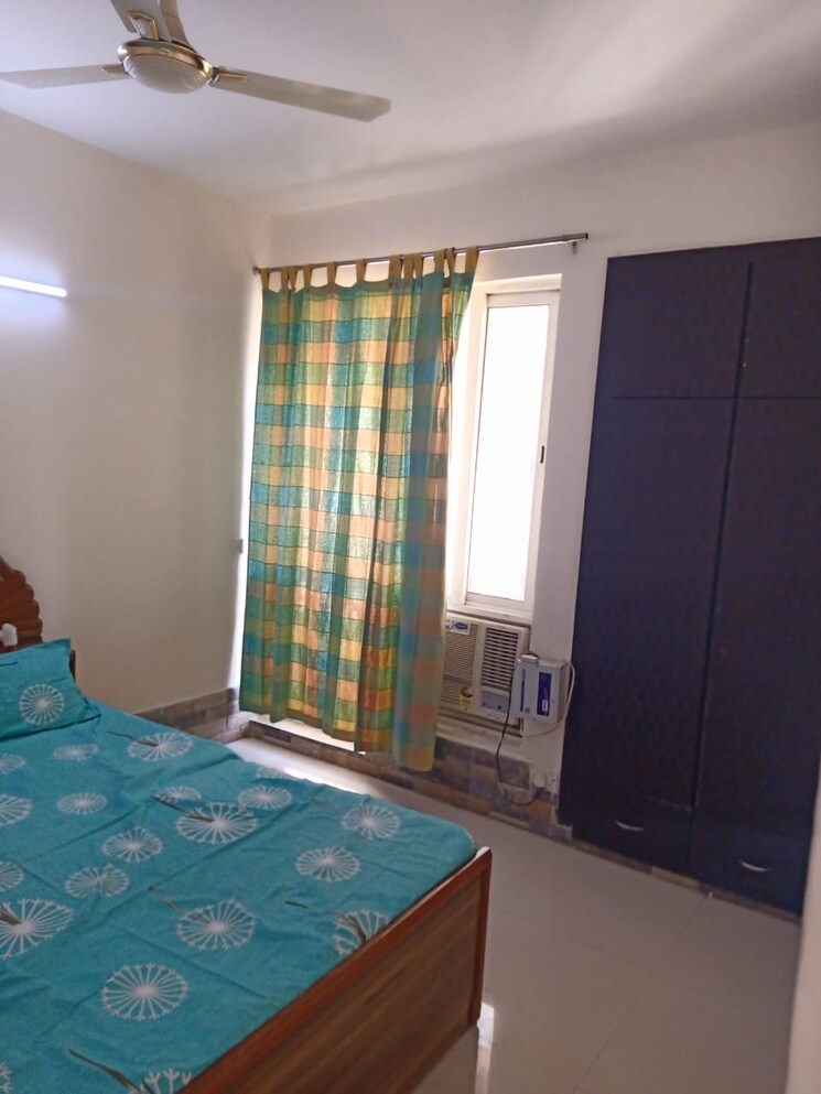 Bedroom, jaypee-greens-kosmos 2 Bedroom 950 Sq.Ft. Apartment In Sector 134 Noida 8710864